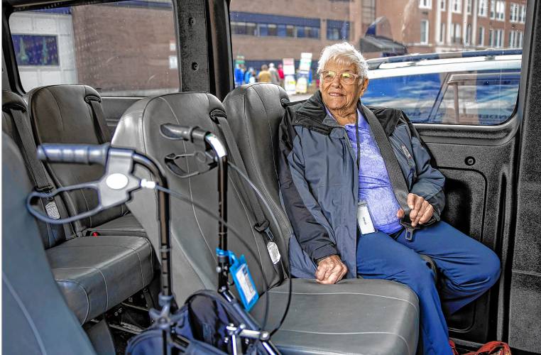 Doris Weinberg reflects on voting in the past as she waits for the other voters in the Peabody Place van on Tuesday.