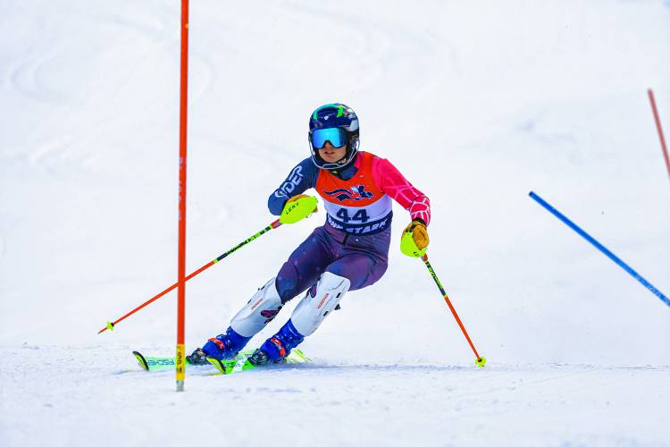 John Stark’s Austin Freeman competes at the Capital Cup Alpine ski race on Wednesday at Proctor Academy. Freeman finished third in the boys’ slalom.
