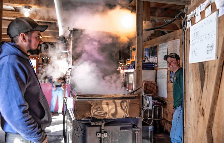 Asa (left) and Wille Matras of Matras Maple Sugarhouse in Pittsfield talk while they boil sap on Monday, March 10, 2025. The sugarhouse will be open this weekend for the New Hampshire Maple Weekend. To learn more, go to their website at https://www.matrasmaple.com/
