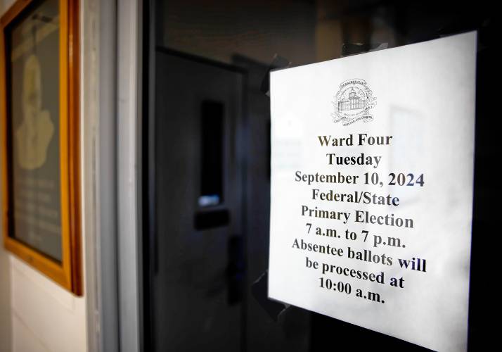 A voting sign on the door of the Green Street Community Center in Concord.