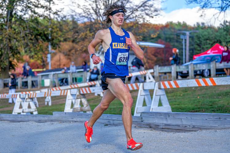 Kearsarge’s Daniel Dalbec races towards the finish line at the NHIAA Division III boys’ cross country championship at Derryfield Park in Manchester on Saturday. Dalbec finished third. 