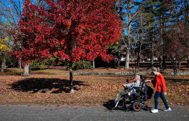 Concord couple James Piet and Patricia Vincent-Piet enjoy the accessiblity of Rollins Park which is close to their South Concord home. However, he is getting used to his new custom chair and it can only go on paved surfaces.