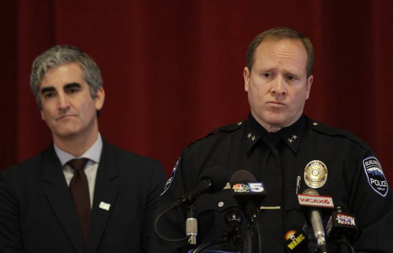 Burlington Police Chief Jon Murad listens to questions at a news conference with Mayor Miro Weinberger, left, in Burlington, Vt., on Monday, Nov. 27, 2023, about the shooting of three college students of Palestinian descent, which is being investigated as a possible hate crime. A suspect, Jason Eaton, pleaded not guilty to attempted murder Monday in connection with the weekend shooting. (AP Photo/Hasan Jamali)