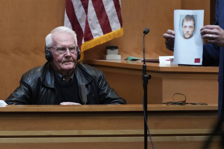 Douglas Small testifies as the prosecution holds up a photograph of Adam Montgomery during the trial of the Adam Montgomery at Hillsborough County Superior Court, Tuesday, Feb. 20, 2024, in Manchester, N.H. Montgomery is facing second-degree murder and other charges in the death of his daughter, Harmony. (AP Photo/Charles Krupa, Pool)