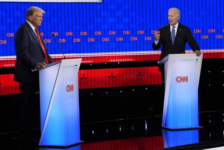 Former President Donald Trump, left, and President Joe Biden participate in a CNN presidential debate Thursday in Atlanta.