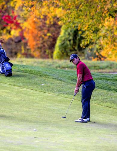 Concord’s Carl Sirriana watches his putt just miss for a birdie on the first hole at Canterbury Woods Country Club on Tuesday.