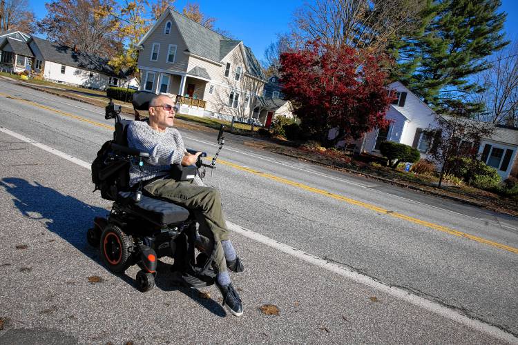 Concord couple James Piet and Patricia Vincent-Piet enjoy the accessibility of Rollins Park, which is close to their South Concord home. However, Piet is getting used to his new custom chair, which can only be used on paved surfaces. Sometimes Piet has to travel on the side of Broadway on his way to the park.