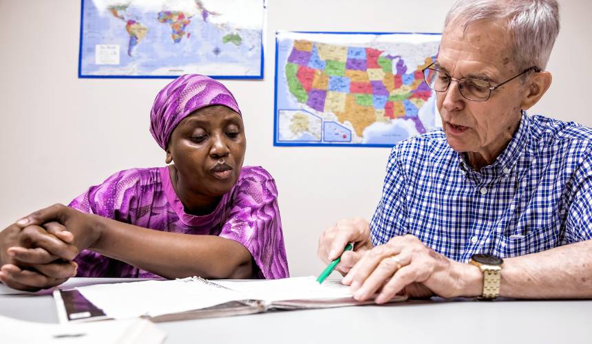 Odette Kanzayire has been tutored by Terry Irwin, a volunteer with Overcomers Refugee Services, for more than a year.
