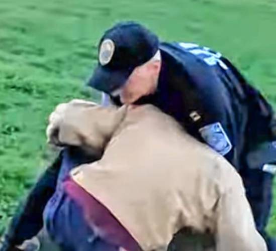 A video screenshot shows the arrest of UNH student Aidan Turner by UNH police officer and department prosecutor Frank Weeks following a protest on campus May 1.