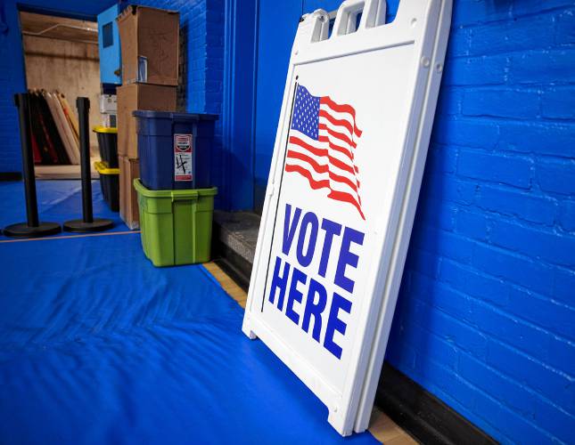 A voting sign leans against a wall at the Green Street Community Center on Monday, September 9, 2024.