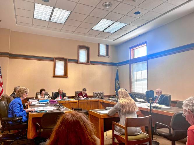 Rep. Rebecca McWilliams speaks before the Legislative Ethics Committee about her request that it rule on to what extent a new law would limit Tara Reardon, her primary opponent in a state Senate race, if elected in November. Rep. Rebecca McWilliams speaks before the Legislative Ethics Committee about her request that it rule on to what extent a new law would limit Tara Reardon, her primary opponent in a state Senate race, if elected in November.