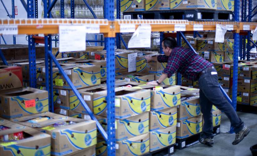 The New Hampshire Food Bank in Manchester is a giant warehouse that collects food to distribute to more than 400 agencies.
