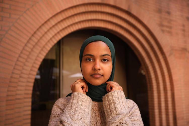 Asna Tabassum, a graduating senior at USC, was selected as valedictorian and offered a traditional slot to speak at the 2024 graduation. After on-and-off campus groups criticized the decision and the university said it received threats, it pulled her from the graduation speakers schedule. Tabassum was photographed on the USC campus on April 16.