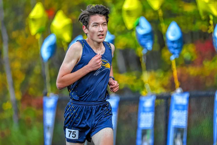 Bow’s Wyatt Worcester races on his home course on Wednesday. Worcester won the race in 18:14 to lead the Falcons to a victory in a four-team meet.