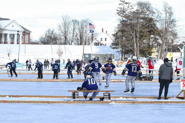 Last Last River Hockey and Lazy River Products played on rink 5 as the sun set with the player's tent at the entrance in view