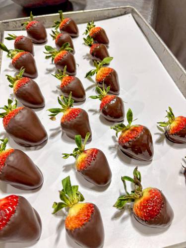 Chocolatiers at the Granite State Candy Shoppe factory on Hall St. Concord prepared chocolates for Valentine's Day on Monday, Feb. 3.