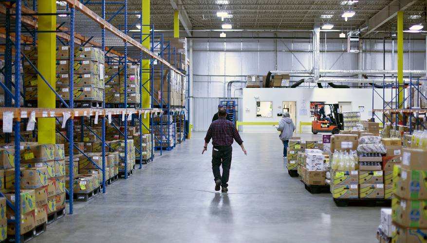 The New Hampshire Food Bank in Manchester is a giant warehouse that collects food to distribute to more than 400 agencies.