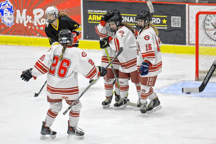 Concord celebrates a goal from Evianna Raimo (second from right) that put the Tide ahead 1-0 against Manchester Central-Memorial-West on Wednesday.