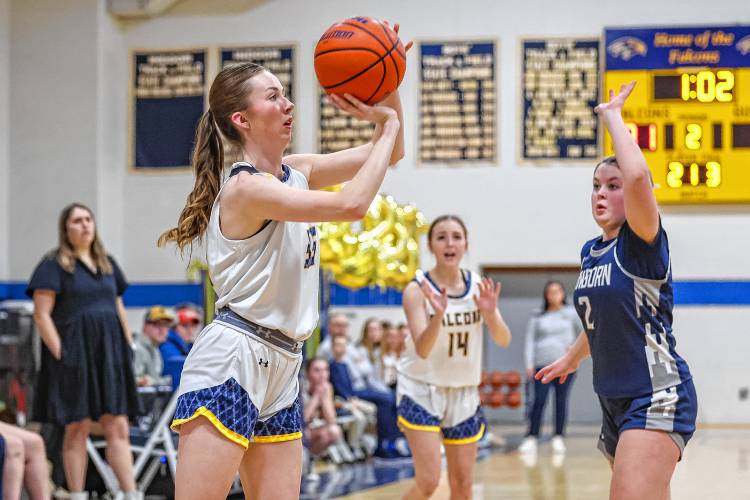 Bow’s Kylie McKee takes a shot during a game at Bow High School on Monday. McKee, a senior, helped lead the Falcons to a 51-17 victory over Sanborn on senior night.