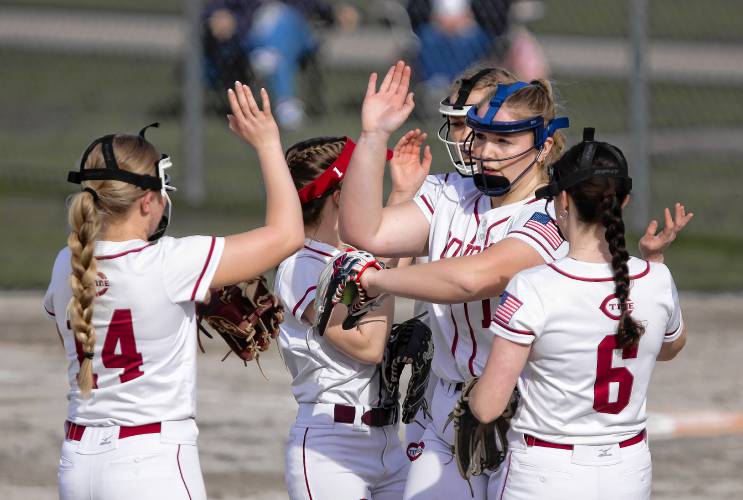 Concord pitcher Maddy Wachter gets congratulations for a strikeout from her teammates on Wednesday, April 17, 2024. Wachter struck out the first seven hitters she faced and wound up throwing a complete game, allowing four hits, two runs, two walks and striking out 12 in Concord’s 3-2 win.