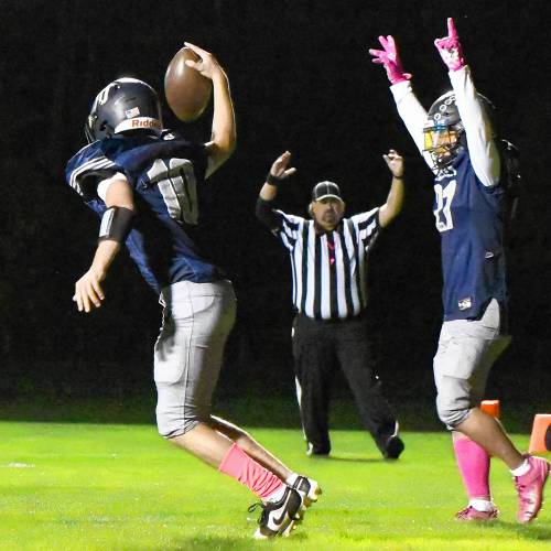 Merrimack Valley’s Jack Parris (10) and Reece Clermont (21) celebrate Parris’ touchdown in the first quarter of a home game on Friday night. Parris ran in the touchdown and passed for another, but MV fell to Kingswood, 20-17.