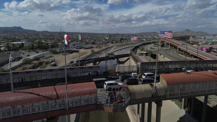 Cars cross the Paso del Norte international bridge at the U.S.-Mexico border, from Ciudad Juarez, Mexico, Wednesday, Nov. 6. Cars cross the Paso del Norte international bridge at the U.S.-Mexico border, from Ciudad Juarez, Mexico, Wednesday, Nov. 6.