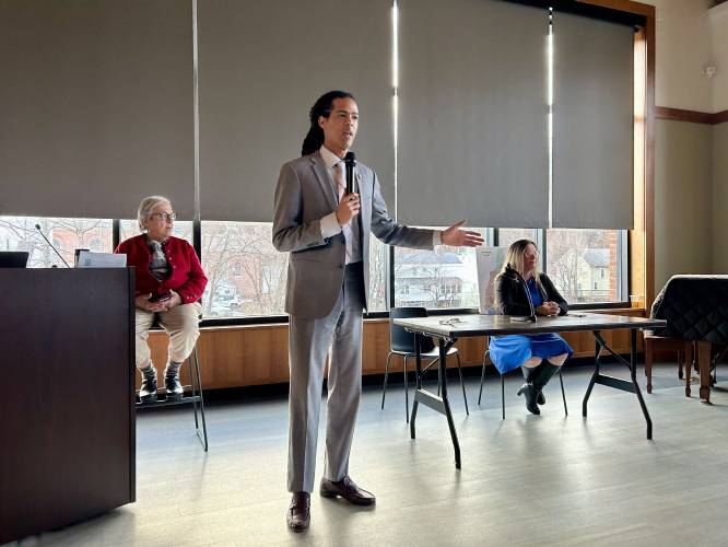 Rep. Jonah Wheeler, a Democrat from Peterborough, speaks to a crowd at a recent town hall after voting for a bill opposed by most members of his party.