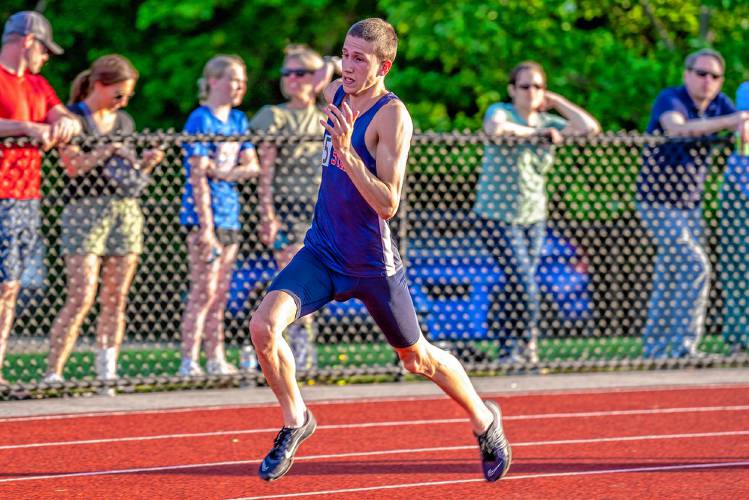 John Stark’s Logan Montgomery races to a title in the 400 meters at the NHIAA Division II championship on Friday at Oyster River High School in Durham. Montgomery won the event in 49.43 seconds to lead the Generals fourth as a team. 