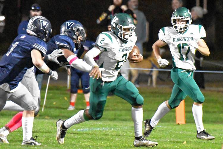 Kingswood running back Tyrese Ryder (2) breaks away from the Merrimack Valley defense for a big gain during a game in Penacook on Friday night. Ryder ran for 132 yards on 17 carries and quarterback Garrett Burke ran for 145 yards and three touchdowns on 27 carries as Kingswood defeated MV, 20-17.