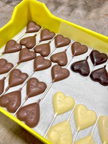 Chocolatiers at the Granite State Candy Shoppe factory on Hall St. Concord prepared chocolates for Valentine's Day on Monday, Feb. 3.