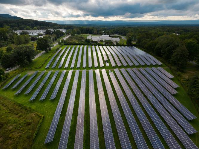 A field of solar panels along West Bay Road in Amherst, Mass. A field of solar panels along West Bay Road in Amherst, Mass.