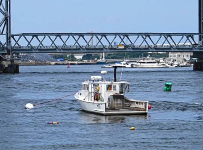 A fishing boat in Portsmouth Harbor, July 29, 2023. 