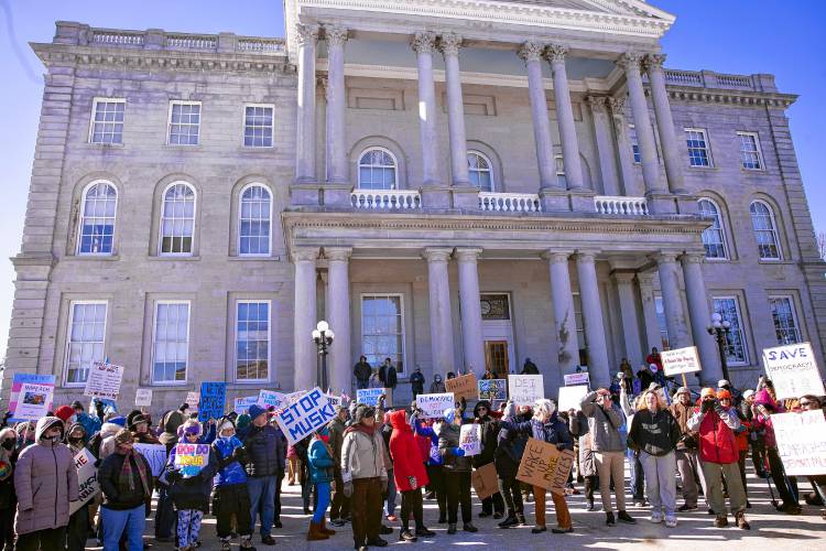 Hundreds of people rallied in front of the State House on Wednesday, February 5, 2025 as part of the national movement to protest the Project 2025.