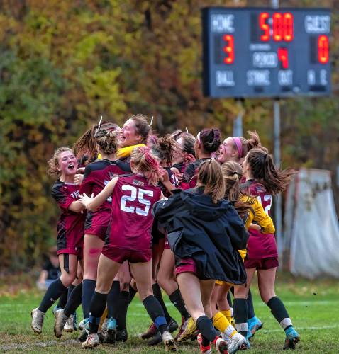 The Concord girls soccer team celebrates after beating Nashua North in a penalty-kick shootout at Memorial Field on Wednesday.