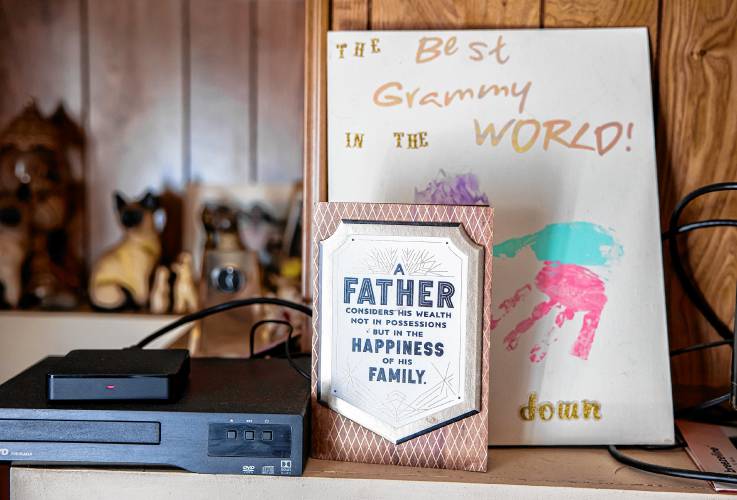  Cards adorn the living room of John Jones and Jessica Helfenstein’s home in Franklin.