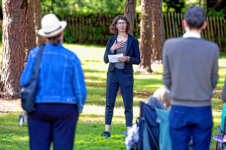 LEFT: Marsha Filion speaks to the people gathered for the memorial for her mother, Barbara Filion.