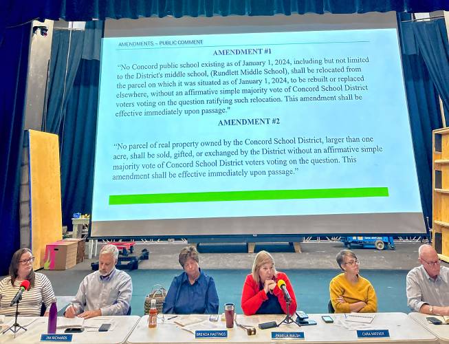 Concord School Board members look on as residents testify on Sept. 9.