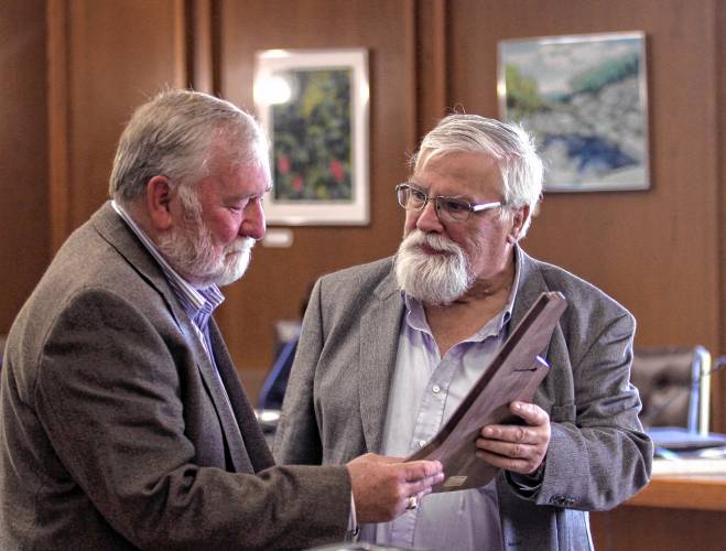 House Speaker Sherman Packard presents former Speaker Steve Shurtleff with a plaque honoring his service on Thursday, October 17, 2024. Packard described Shrutleff as a close friend after working together throughout the years.