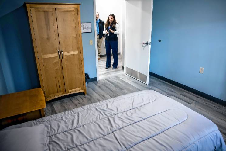 Sarah Gagnon, vice president for clinical operations for Riverbend, shows one of the bedrooms they renovated for the 12-bed facility on Pleasant Street.