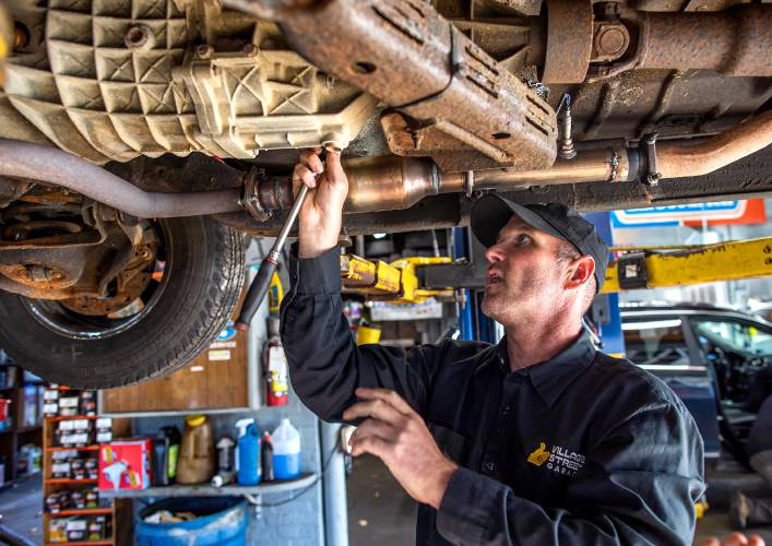 Jeff Chaplain, owner of Village Street Garage in Penacook, works on a vehicle on Thursday, October 8, 2020. Chaplain is an indepedent car repair operation but has no problem with the dealerships. He can get all the techinical data he needs and feels there is work for everyone. Jeff Chaplain, owner of Village Street Garage in Penacook, works on a vehicle on Thursday, October 8, 2020. Chaplain is an indepedent car repair operation but has no problem with the dealerships. He can get all the techinical data he needs and feels there is work for everyone.