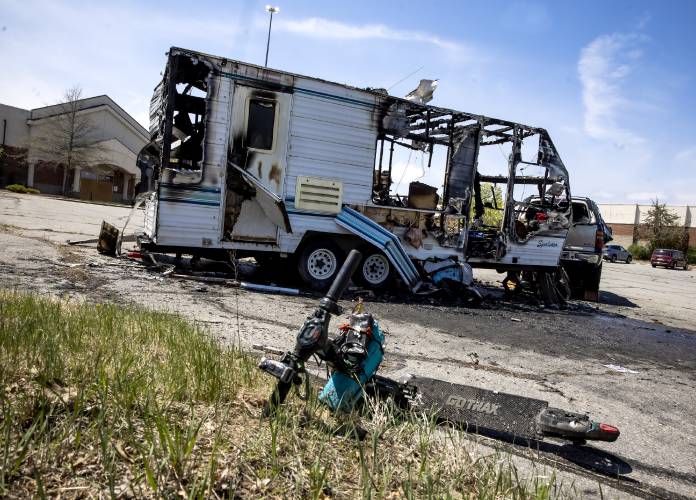 A man died following an RV fire in the parking lot of the Steeplegate Mall early Saturday morning.