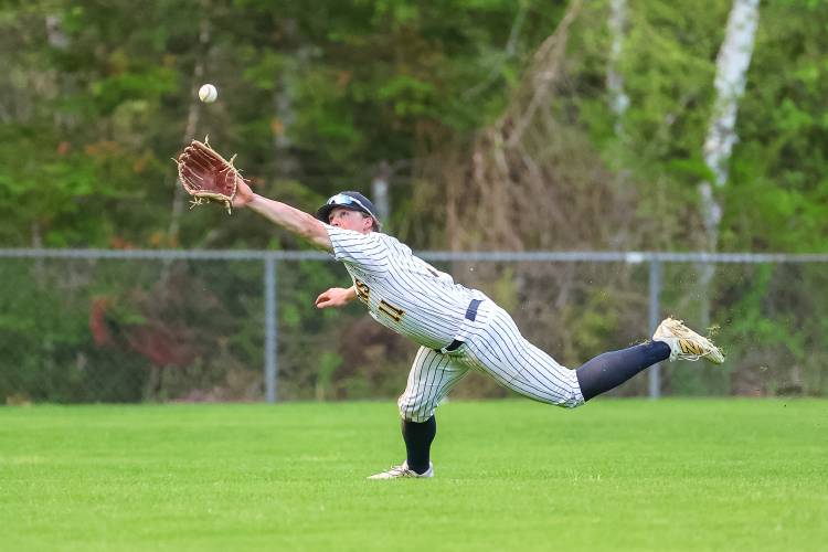 Bow’s Brady Lover extends to make a catch in center field during Bow’s victory on its home field against Plymouth. Lover also had two hits in the Falcons’ 7-3 victory on Wednesday.