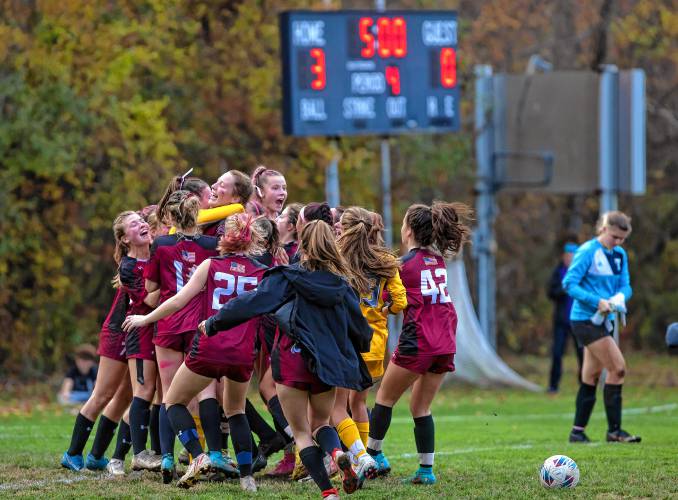 The Concord girls soccer team celebrate after beating Nashua North in a shootout on Wednesday, October 25, 2023 at Memorial field.