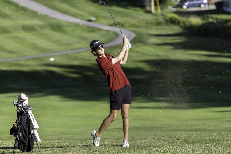 Concord’s Keller Ramshaw watches his approach shot on the seventh hole at Derryfield Country Club in the Crimson Tide's first match of the season on Wednesday. Concord defeated Salem and Manchester Memorial. Concord’s Keller Ramshaw watches his approach shot on the seventh hole at Derryfield Country Club in the Crimson Tide's first match of the season on Wednesday. Concord defeated Salem and Manchester Memorial.
