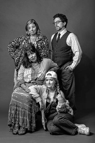 Rachael Chapin Longo, Glenn Provost, Deirdre Hickok Bridge (seated), and Emma Cahoon (floor) in theatre KAPOW's Life Sucks.