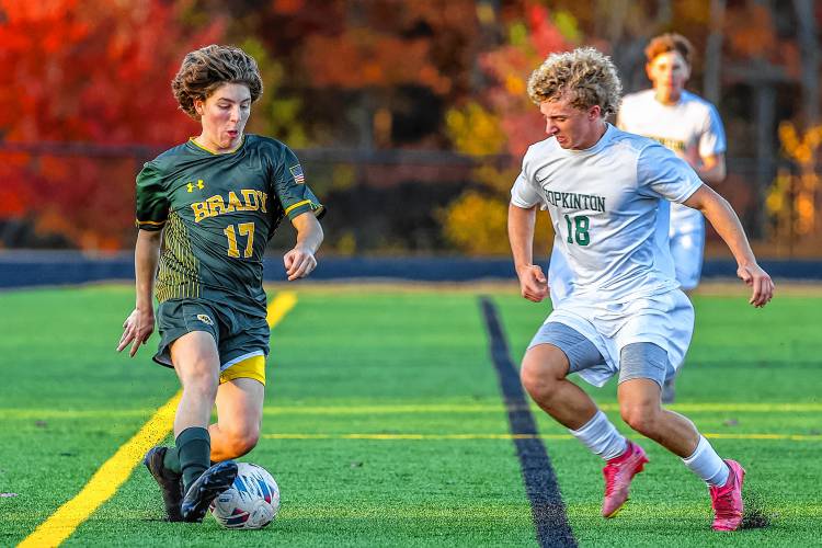 Bishop Brady’s Andrew King (17) tries to break through Hopkinton’s defense while junior defender Shane Smith (18) closes down on Oct. 22. Hopkinton defeated Bishop Brady late in the regular season and again in Wednesday’s preliminary round. Bishop Brady’s Andrew King (17) tries to break through Hopkinton’s defense while junior defender Shane Smith (18) closes down on Oct. 22. Hopkinton defeated Bishop Brady late in the regular season and again in Wednesday’s preliminary round.