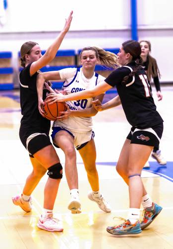 Concord Christian guard Emma Smith splits two Keene defenders and gets fouled during the fourth quarter on Monday night. Smith scored a game-high 21 points to lead No. 4 Concord Christian to a 55-42 victory over No. 13 Keene in the Division I preliminary round. Concord Christian will play in the quarterfinals on Thursday. Concord Christian guard Emma Smith splits two Keene defenders and gets fouled during the fourth quarter on Monday night. Smith scored a game-high 21 points to lead No. 4 Concord Christian to a 55-42 victory over No. 13 Keene in the Division I preliminary round. Concord Christian will play in the quarterfinals on Thursday.