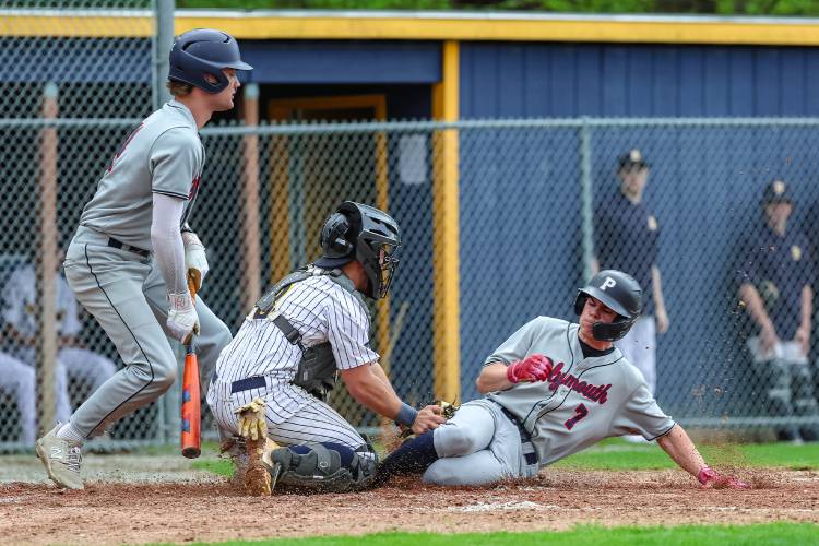 Bow catcher Owen Webber (center) tags out a Plymouth baserunner at home plate during Bow’s 7-3 victory on the Falcons' home field on Wednesday.