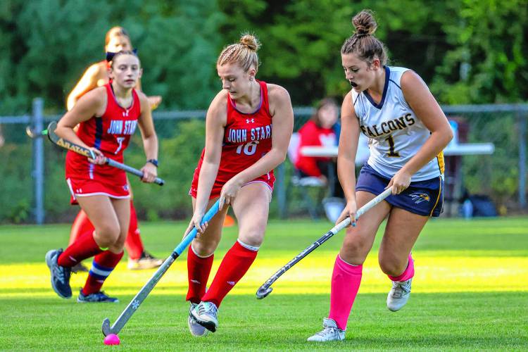 Lauryn Guevin (left) controls the ball for the Generals in a matchup with Bow on Sept. 14, a couple weeks after she had surgery to remove a cancerous growth from under her ear lobe.