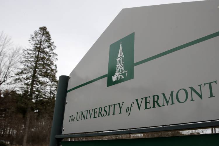FILE - A sign on the University of Vermont campus in Burlington, Vt., is pictured on March 11, 2020. Police say three young men of Palestinian descent who were attending a Thanksgiving holiday gathering were shot and injured near the University of Vermont campus. Police are searching for the suspect after the three were shot late Saturday, Nov. 25, 2023, in Burlington. (AP Photo/Charles Krupa, File)